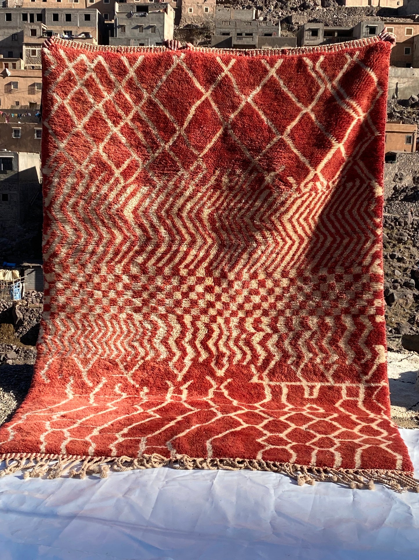 Beni Ourain rugs originate from the Atlas Mountains of Morocco and are characterized by their distinctive, neutral-toned, and geometric designs. These handwoven rugs often feature a plush pile and are made by the Berber tribes, size is 270x168 cm