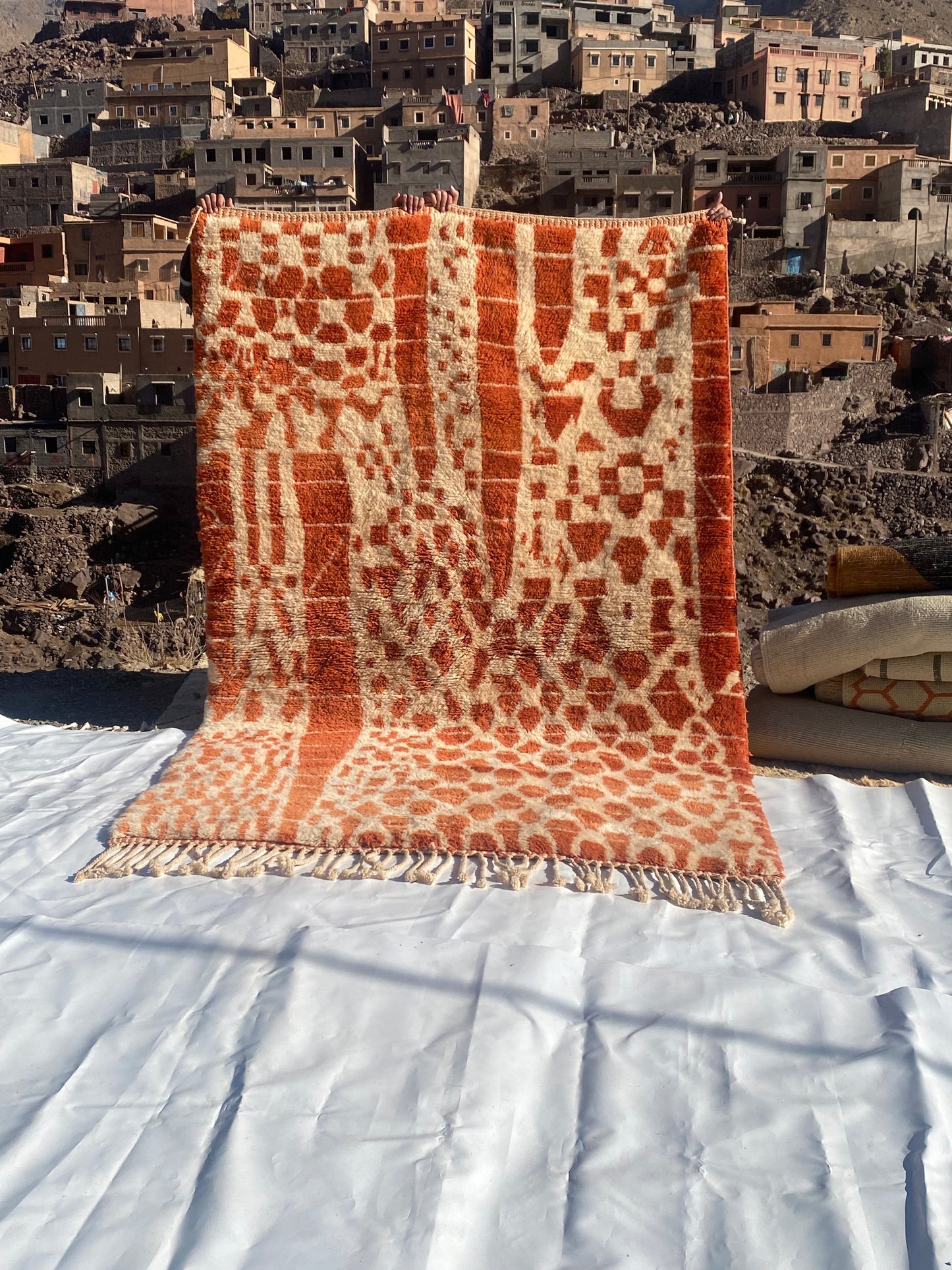 Beni Ourain rugs originate from the Atlas Mountains of Morocco and are characterized by their distinctive, neutral-toned, and geometric designs. These handwoven rugs often feature a plush pile and are made by the Berber tribes, size is 270x180 cm