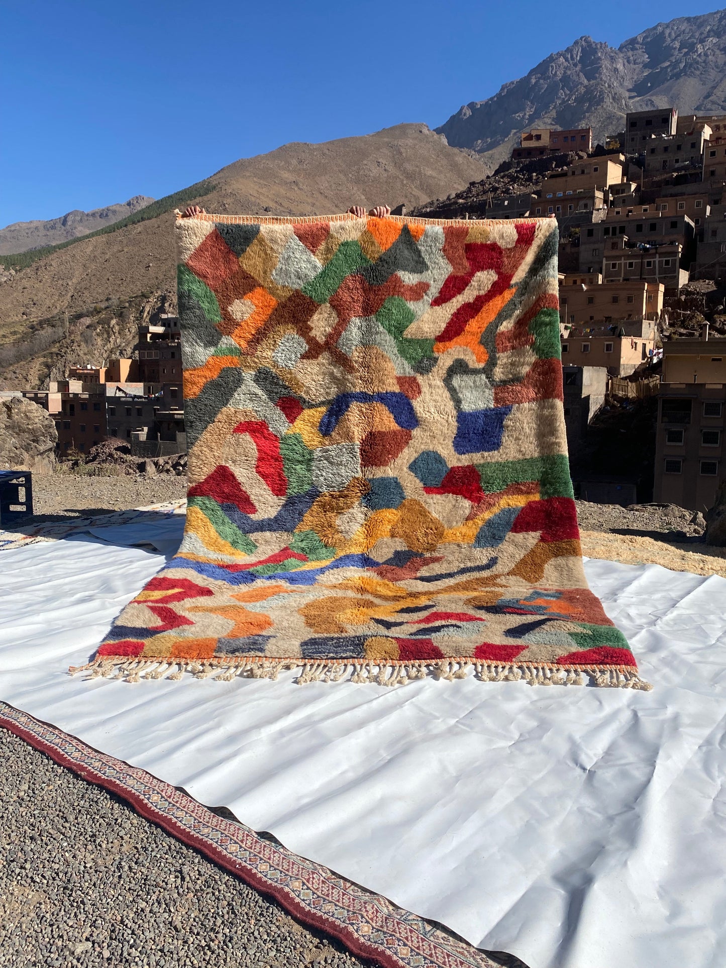 Beni Ourain rugs originate from the Atlas Mountains of Morocco and are characterized by their distinctive, neutral-toned, and geometric designs. These handwoven rugs often feature a plush pile and are made by the Berber tribes, size is 300x200 cm