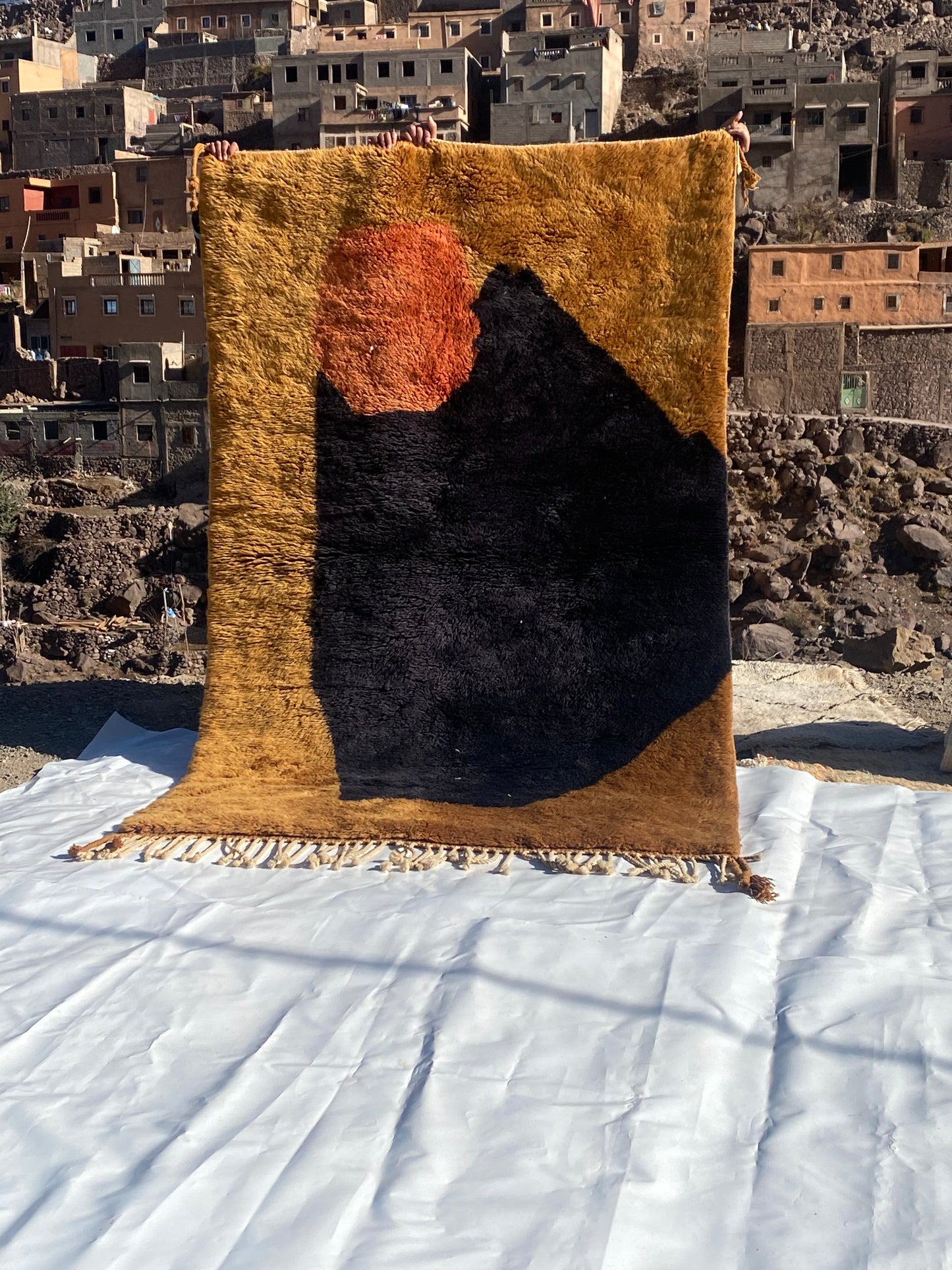 Beni Ourain rugs originate from the Atlas Mountains of Morocco and are characterized by their distinctive, neutral-toned, and geometric designs. These handwoven rugs often feature a plush pile and are made by the Berber tribes, size is 240x150 cm