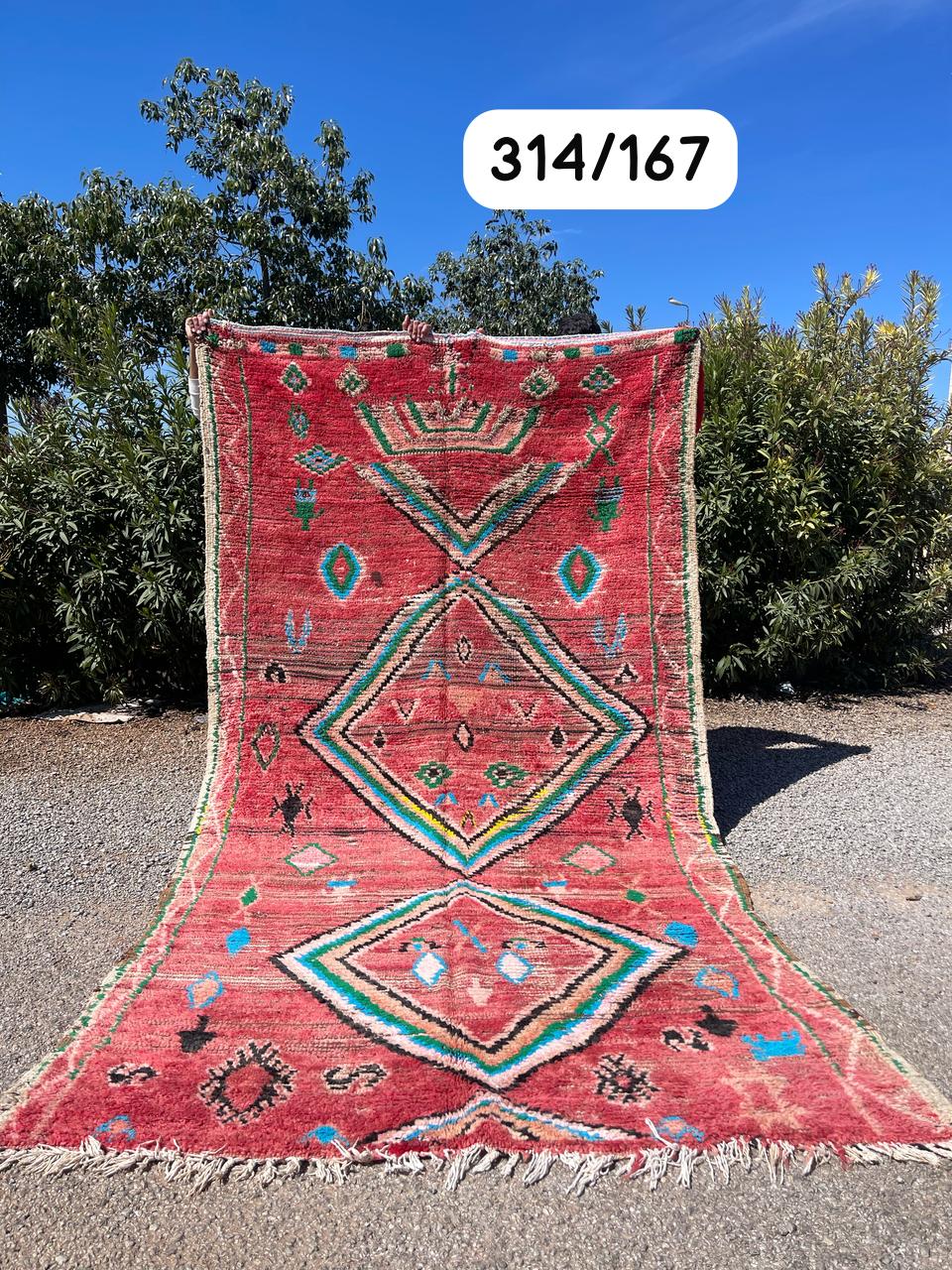 Transform your space with the exquisite charm of our Fabulous Boujad Rug, a true work of art crafted by skilled artisans in the heart of Morocco. This authentic Moroccan rug showcases the rich heritage and vibrant culture of the Boujad region