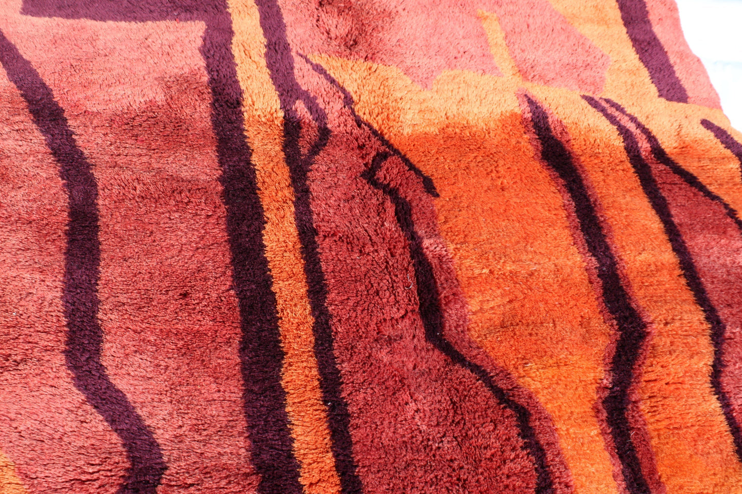 Beni Ourain rugs originate from the Atlas Mountains of Morocco and are characterized by their distinctive, neutral-toned, and geometric designs. These handwoven rugs often feature a plush pile and are made by the Berber tribes, size is 270x192 cm