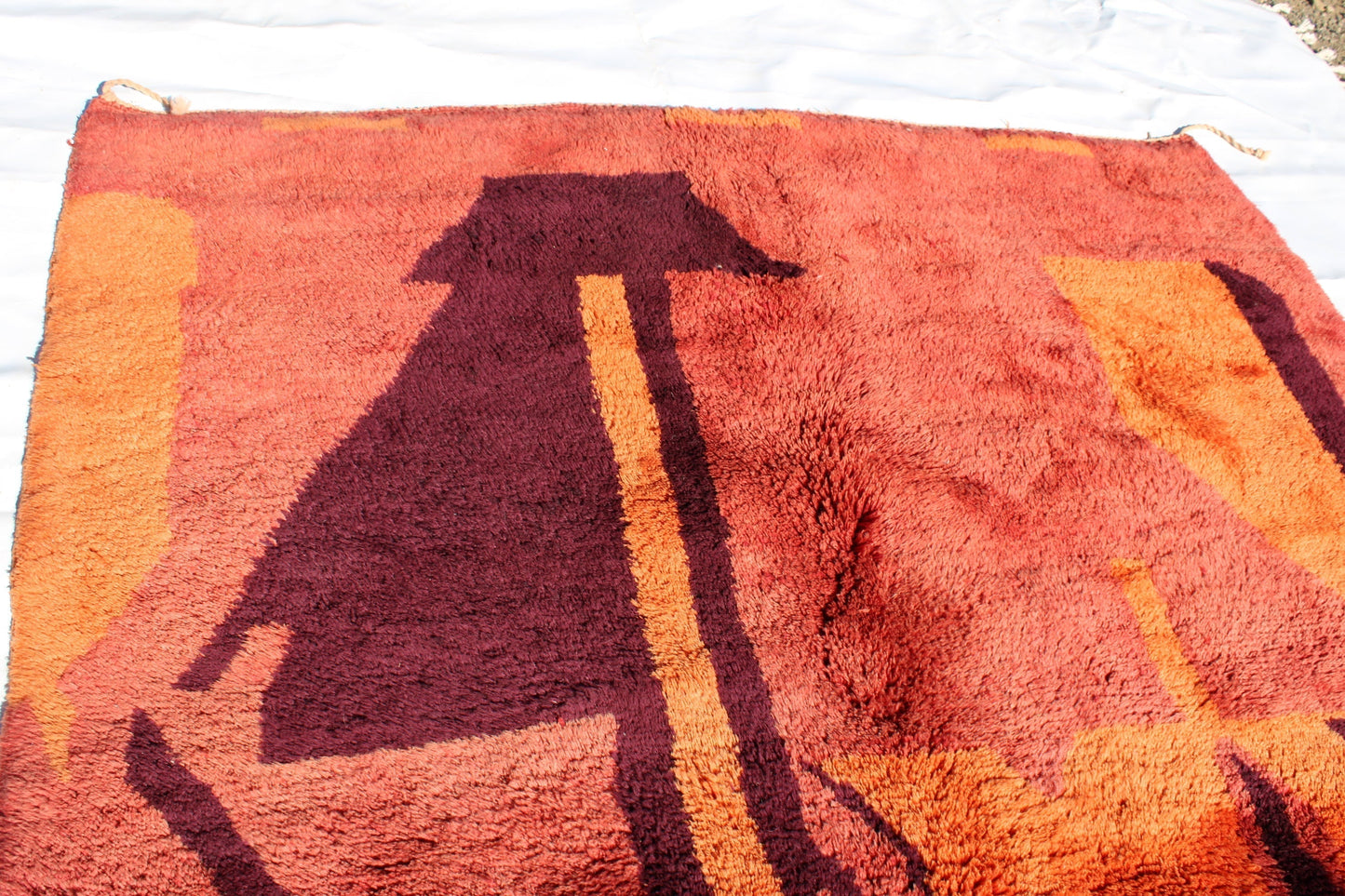 Beni Ourain rugs originate from the Atlas Mountains of Morocco and are characterized by their distinctive, neutral-toned, and geometric designs. These handwoven rugs often feature a plush pile and are made by the Berber tribes, size is 270x192 cm
