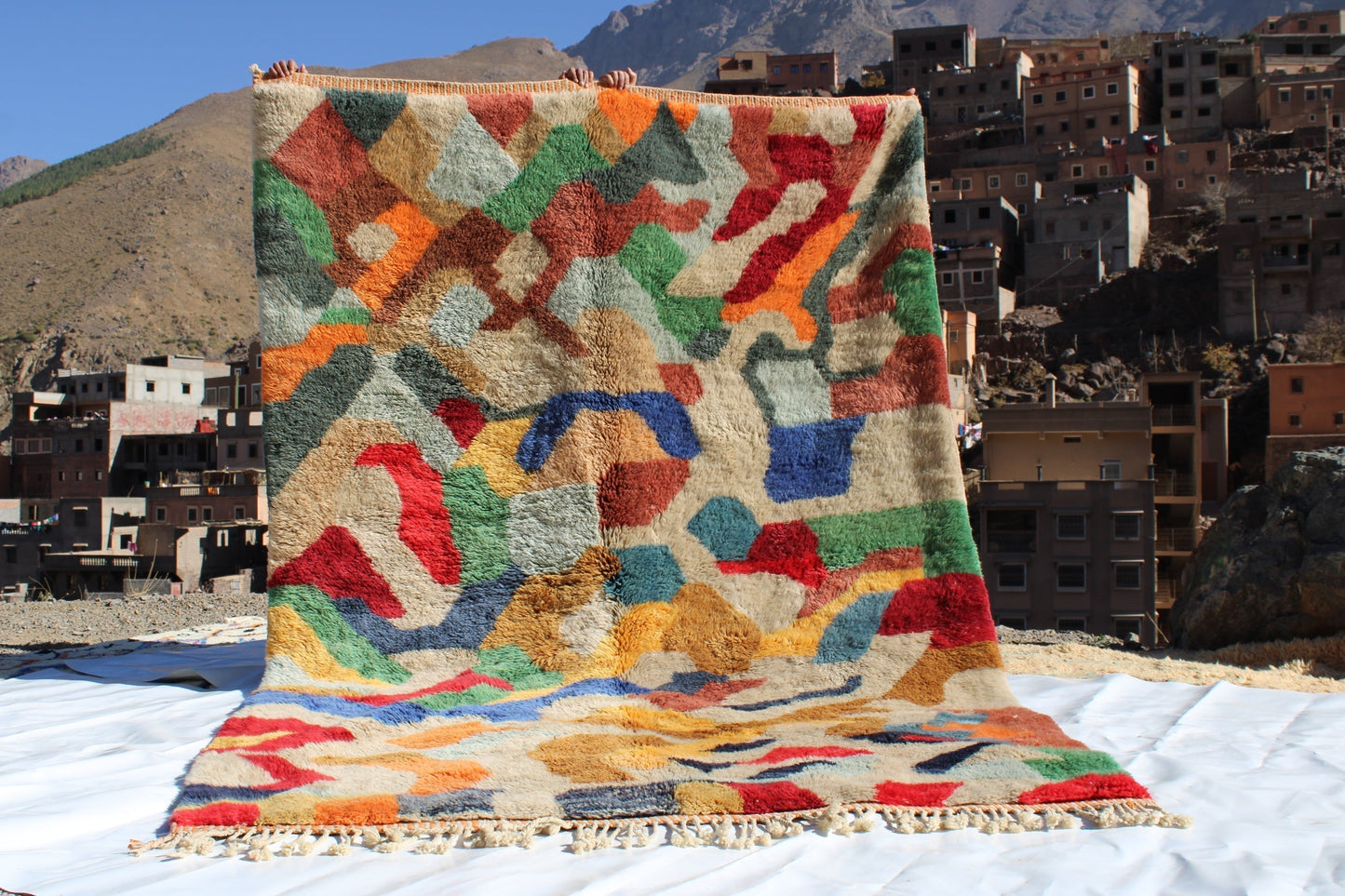Beni Ourain rugs originate from the Atlas Mountains of Morocco and are characterized by their distinctive, neutral-toned, and geometric designs. These handwoven rugs often feature a plush pile and are made by the Berber tribes, size is 300x200 cm