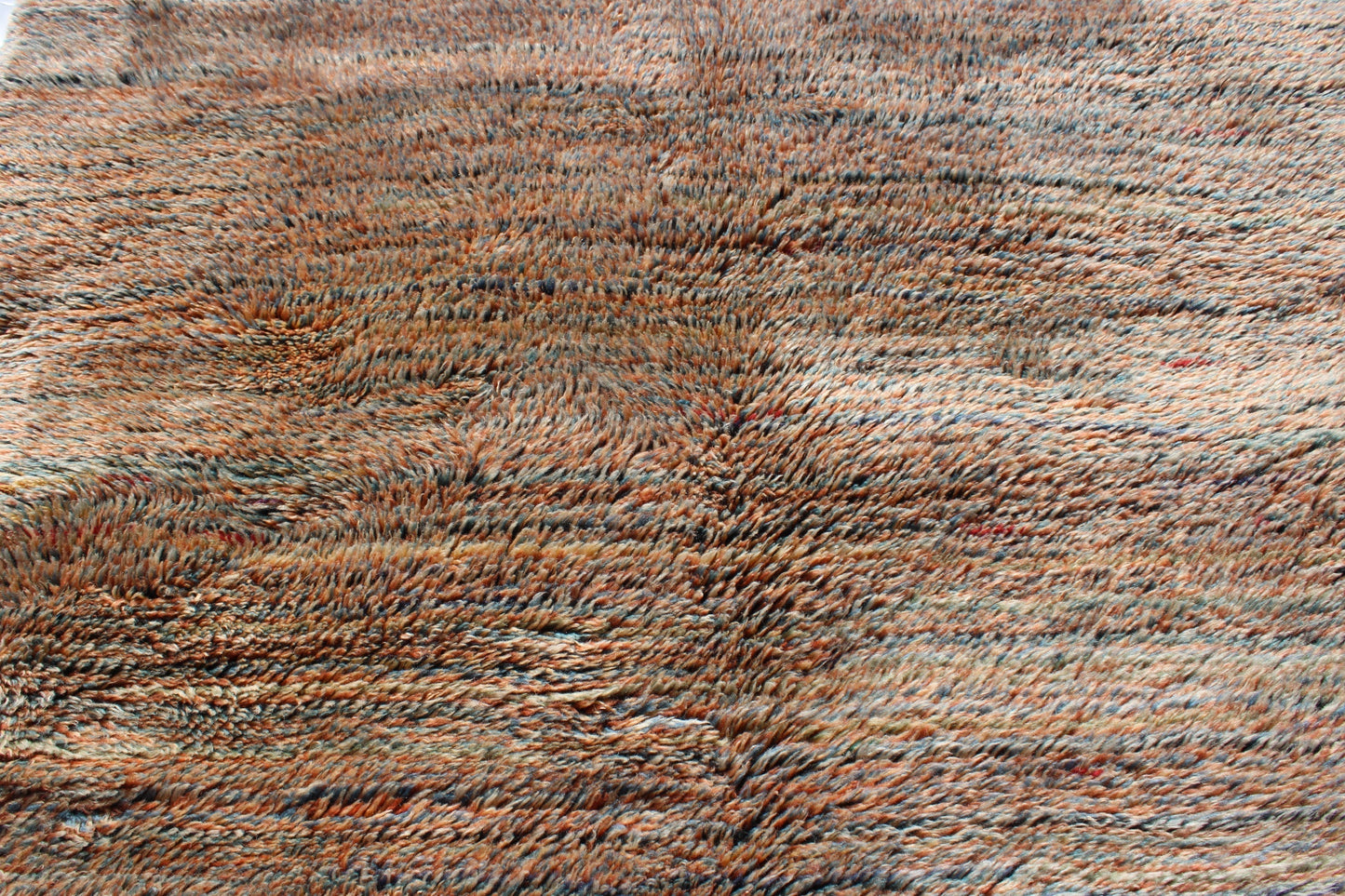 Beni Ourain rugs originate from the Atlas Mountains of Morocco and are characterized by their distinctive, neutral-toned, and geometric designs. These handwoven rugs often feature a plush pile and are made by the Berber tribes, size is 250x155 cm