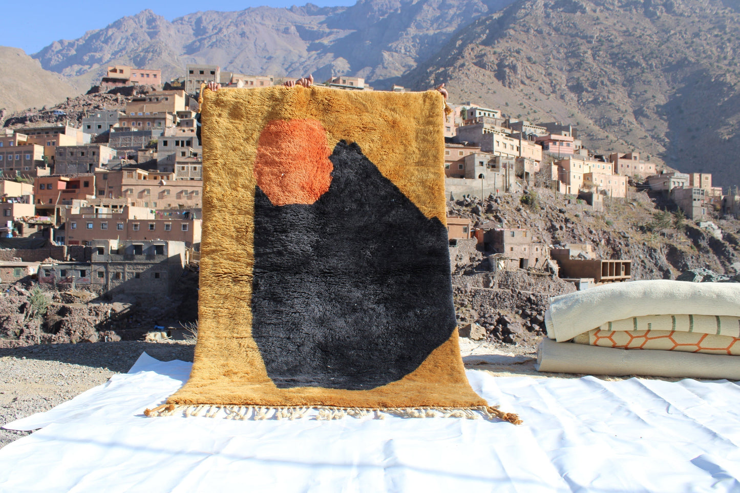 Beni Ourain rugs originate from the Atlas Mountains of Morocco and are characterized by their distinctive, neutral-toned, and geometric designs. These handwoven rugs often feature a plush pile and are made by the Berber tribes, size is 240x150 cm