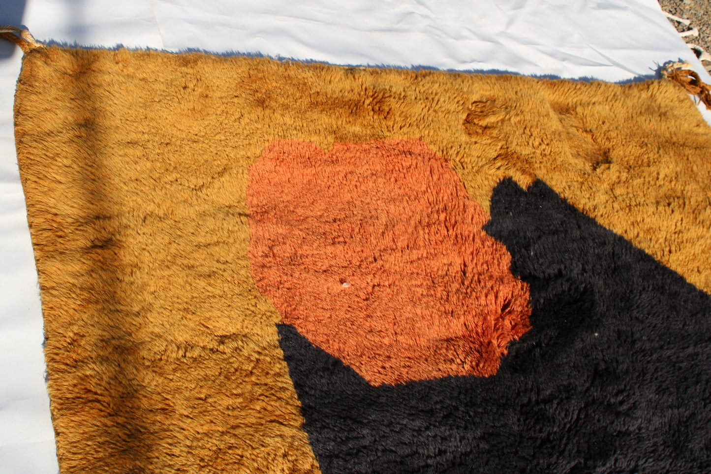 Beni Ourain rugs originate from the Atlas Mountains of Morocco and are characterized by their distinctive, neutral-toned, and geometric designs. These handwoven rugs often feature a plush pile and are made by the Berber tribes, size is 240x150 cm