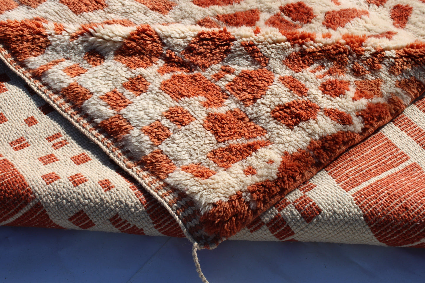 Beni Ourain rugs originate from the Atlas Mountains of Morocco and are characterized by their distinctive, neutral-toned, and geometric designs. These handwoven rugs often feature a plush pile and are made by the Berber tribes, size is 270x180 cm