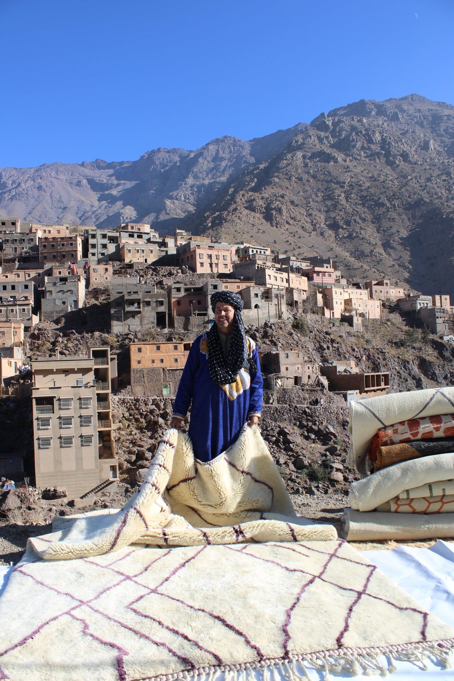 Beni Ourain rugs originate from the Atlas Mountains of Morocco and are characterized by their distinctive, neutral-toned, and geometric designs. These handwoven rugs often feature a plush pile and are made by the Berber tribes, size is 310x210 cm