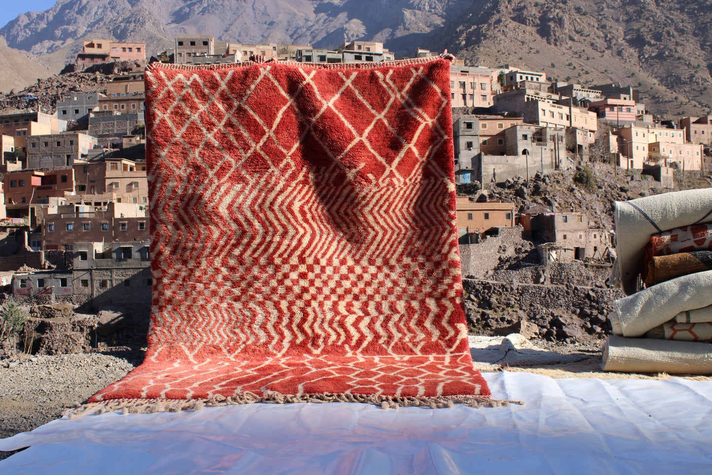 Beni Ourain rugs originate from the Atlas Mountains of Morocco and are characterized by their distinctive, neutral-toned, and geometric designs. These handwoven rugs often feature a plush pile and are made by the Berber tribes, size is 270x168 cm