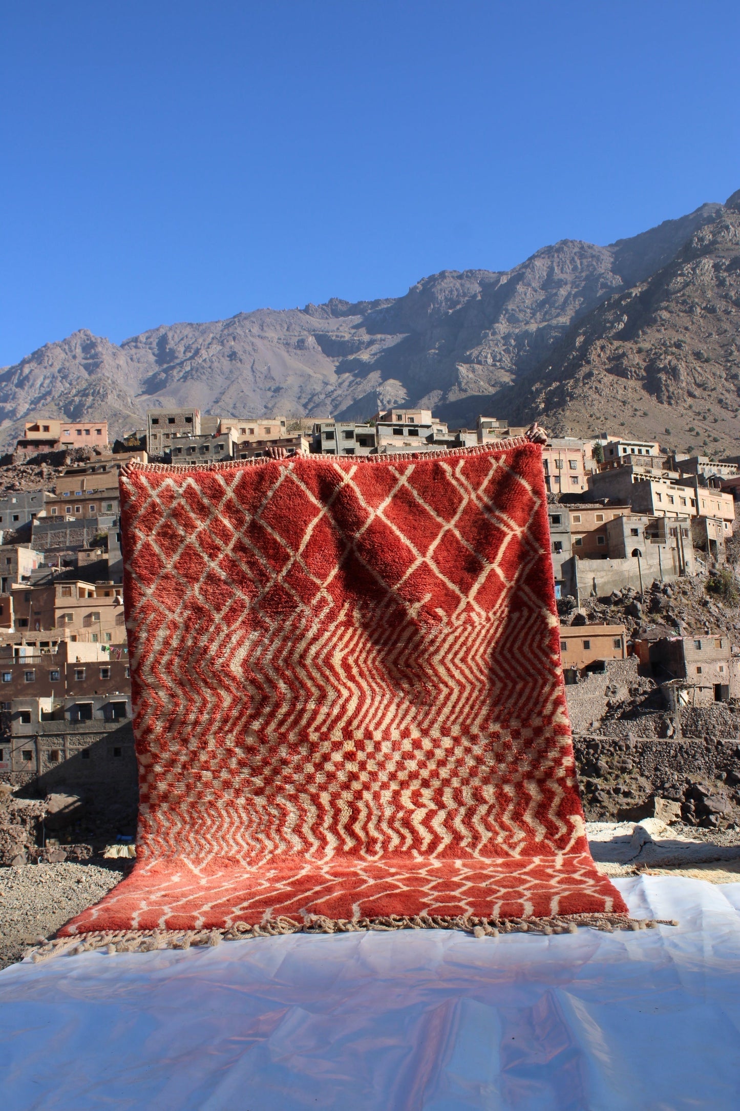 Beni Ourain rugs originate from the Atlas Mountains of Morocco and are characterized by their distinctive, neutral-toned, and geometric designs. These handwoven rugs often feature a plush pile and are made by the Berber tribes, size is 270x168 cm
