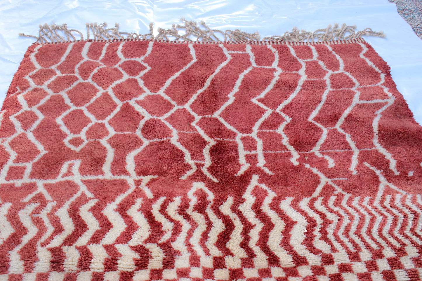 Beni Ourain rugs originate from the Atlas Mountains of Morocco and are characterized by their distinctive, neutral-toned, and geometric designs. These handwoven rugs often feature a plush pile and are made by the Berber tribes, size is 270x168 cm