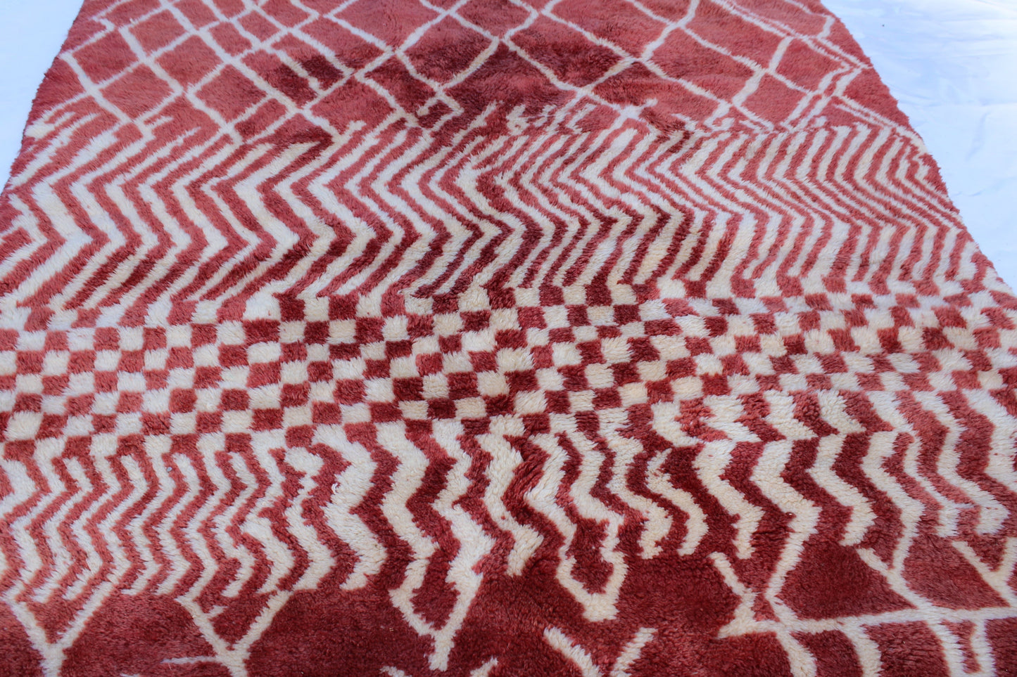 Beni Ourain rugs originate from the Atlas Mountains of Morocco and are characterized by their distinctive, neutral-toned, and geometric designs. These handwoven rugs often feature a plush pile and are made by the Berber tribes, size is 270x168 cm