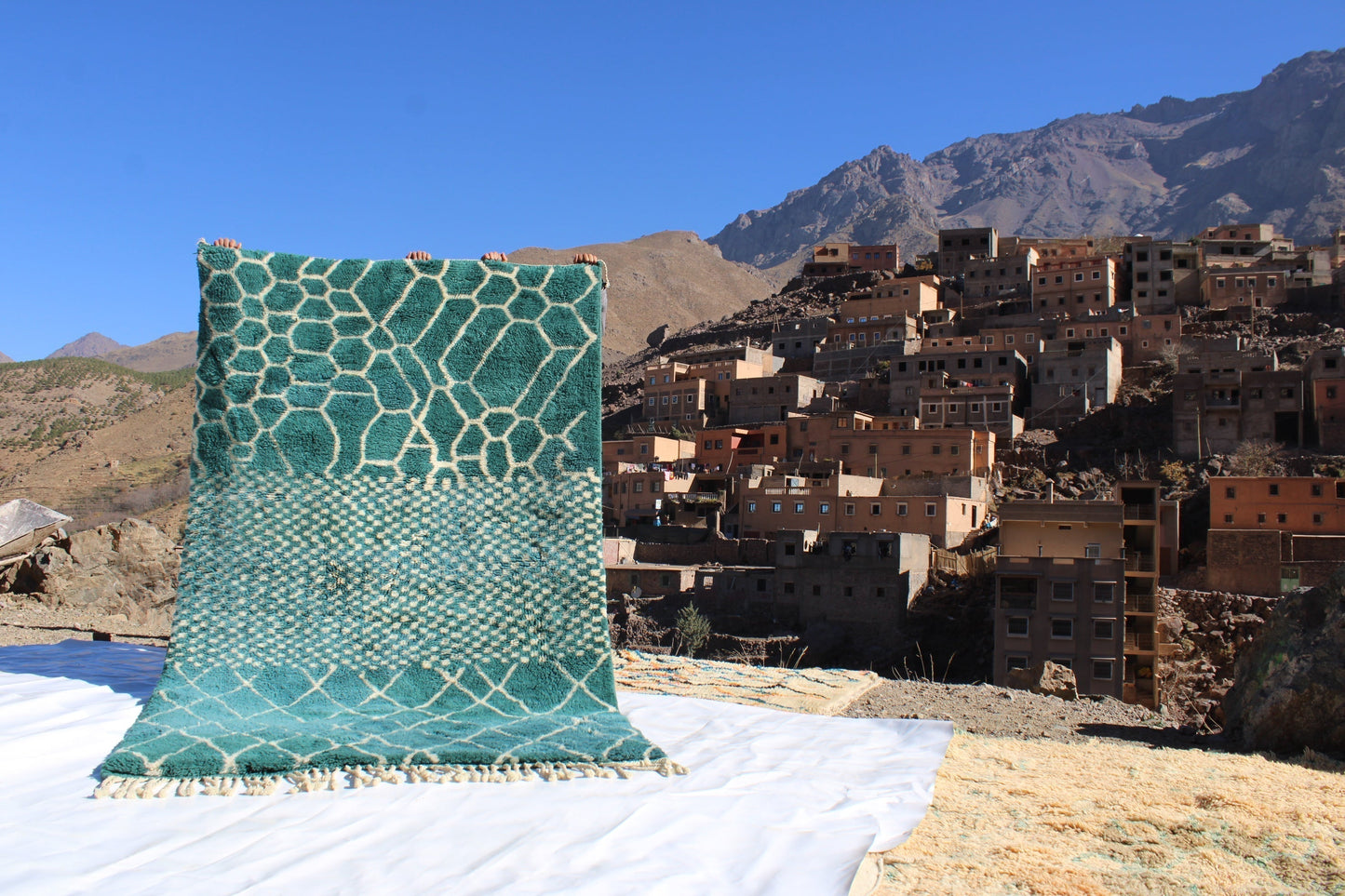 Beni Ourain rugs originate from the Atlas Mountains of Morocco and are characterized by their distinctive, neutral-toned, and geometric designs. These handwoven rugs often feature a plush pile and are made by the Berber tribes, size is 250x150cm