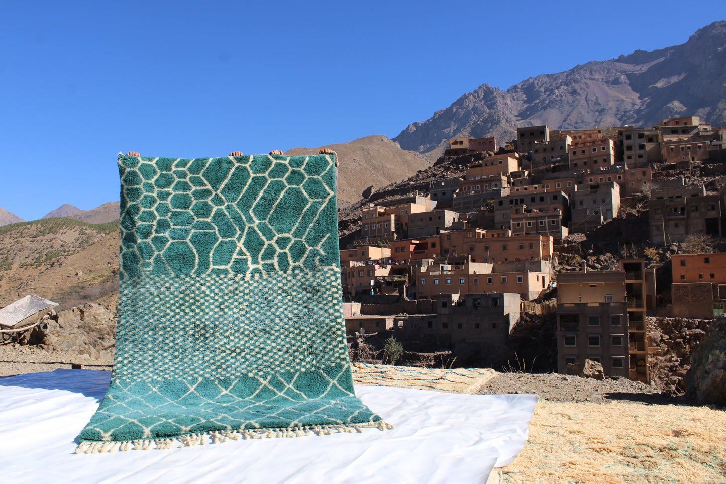 Beni Ourain rugs originate from the Atlas Mountains of Morocco and are characterized by their distinctive, neutral-toned, and geometric designs. These handwoven rugs often feature a plush pile and are made by the Berber tribes, size is 260x192 cm