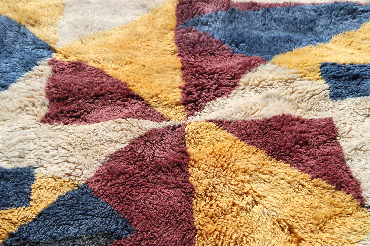Beni Ourain rugs originate from the Atlas Mountains of Morocco and are characterized by their distinctive, neutral-toned, and geometric designs. These handwoven rugs often feature a plush pile and are made by the Berber tribes, size is 280x177 cm