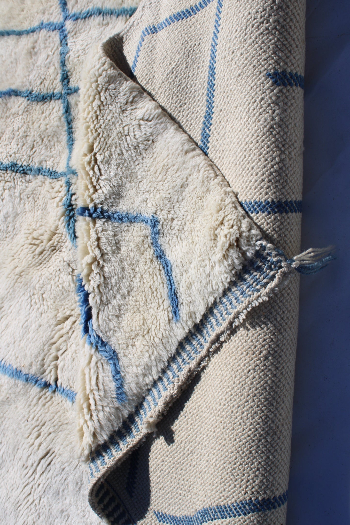 Beni Ourain rugs originate from the Atlas Mountains of Morocco and are characterized by their distinctive, neutral-toned, and geometric designs. These handwoven rugs often feature a plush pile and are made by the Berber tribes, size is 270x192 cm
