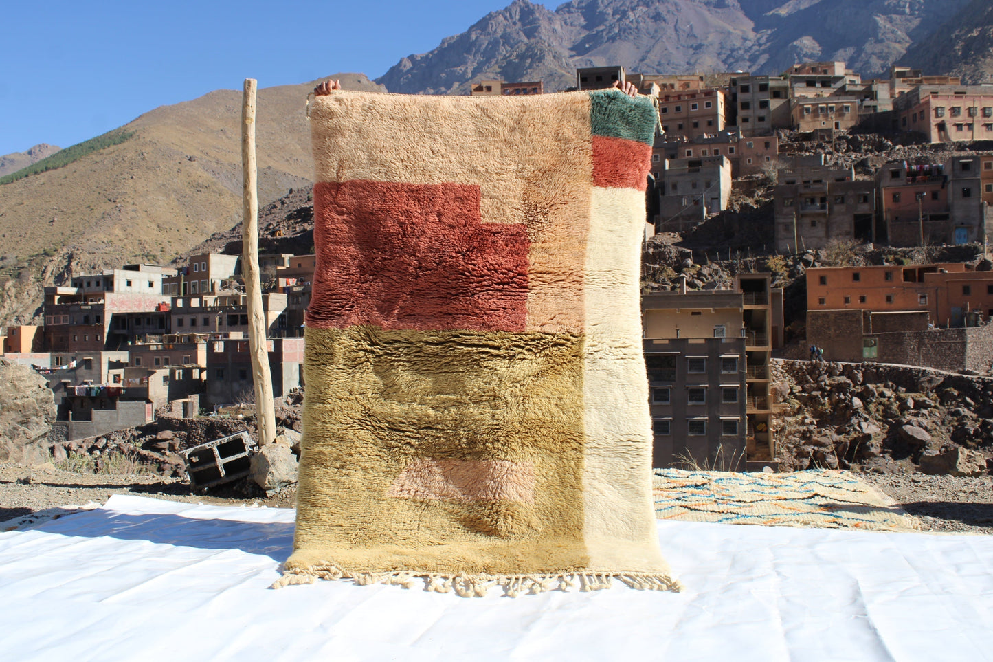 Copy of Beni Ourain rugs originate from the Atlas Mountains of Morocco and are characterized by their distinctive, neutral-toned, and geometric designs. These handwoven rugs often feature a plush pile and are made by the Berber tribes, size is 190x120cm