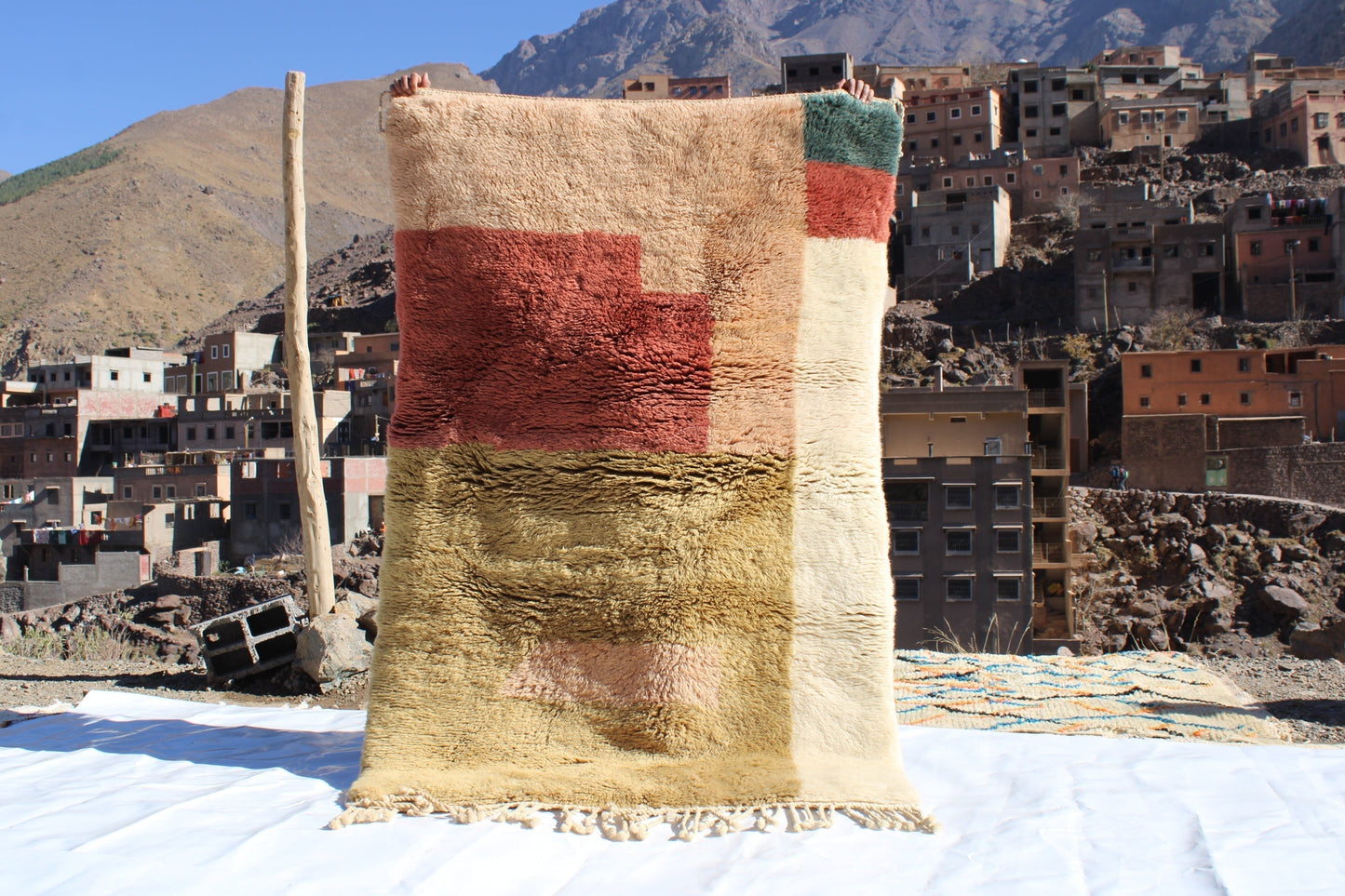 Copy of Beni Ourain rugs originate from the Atlas Mountains of Morocco and are characterized by their distinctive, neutral-toned, and geometric designs. These handwoven rugs often feature a plush pile and are made by the Berber tribes, size is 190x120cm