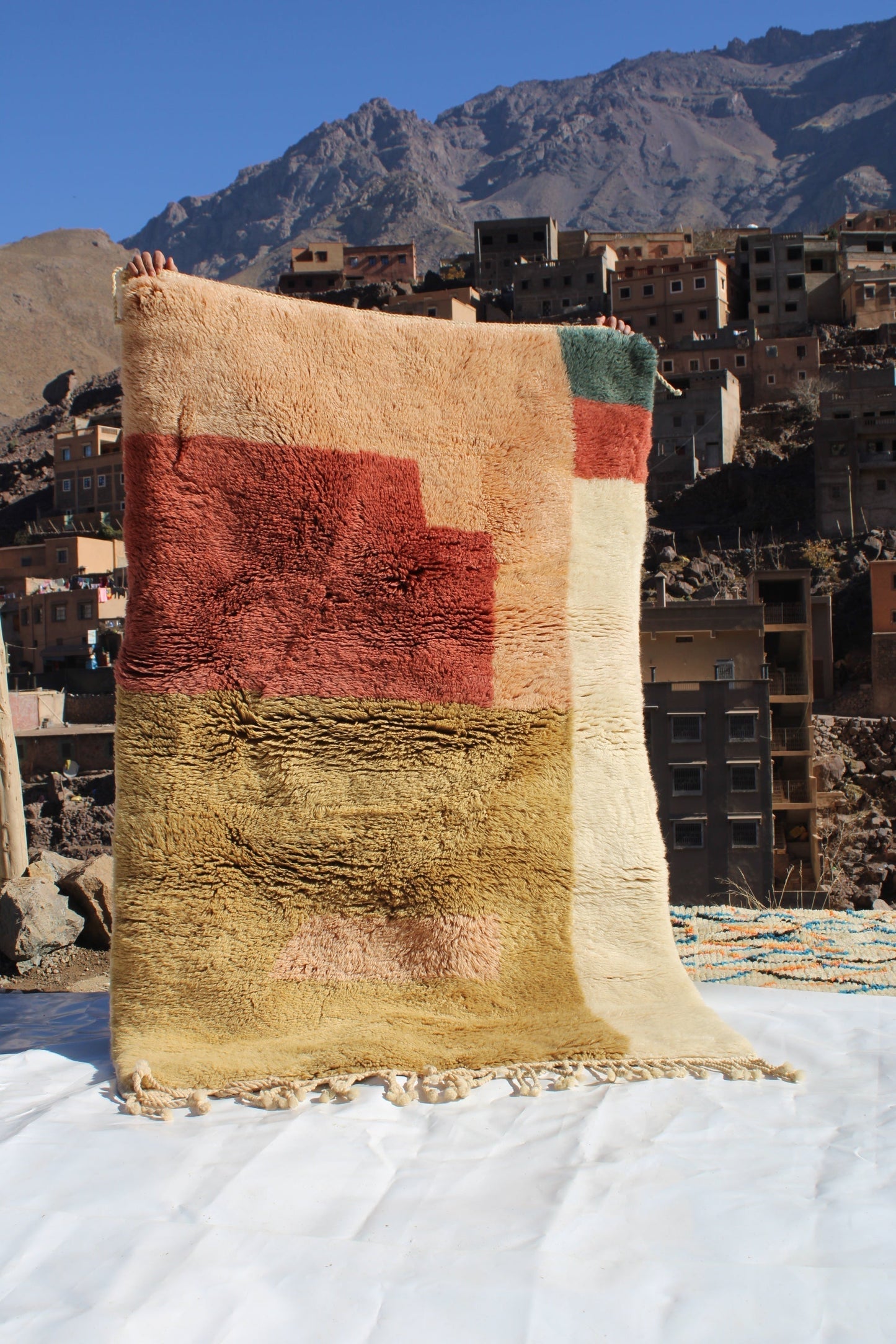 Copy of Beni Ourain rugs originate from the Atlas Mountains of Morocco and are characterized by their distinctive, neutral-toned, and geometric designs. These handwoven rugs often feature a plush pile and are made by the Berber tribes, size is 190x120cm