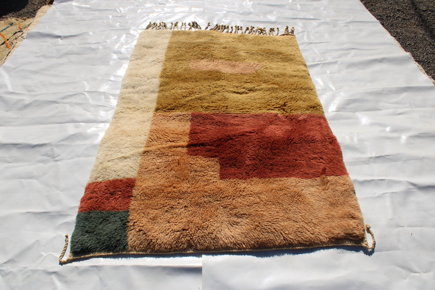 Copy of Beni Ourain rugs originate from the Atlas Mountains of Morocco and are characterized by their distinctive, neutral-toned, and geometric designs. These handwoven rugs often feature a plush pile and are made by the Berber tribes, size is 190x120cm