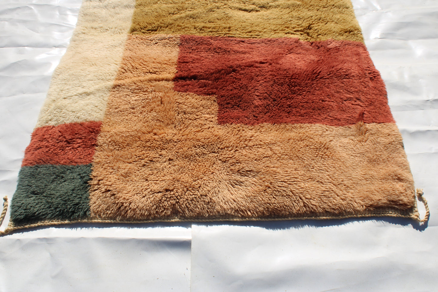 Copy of Beni Ourain rugs originate from the Atlas Mountains of Morocco and are characterized by their distinctive, neutral-toned, and geometric designs. These handwoven rugs often feature a plush pile and are made by the Berber tribes, size is 190x120cm