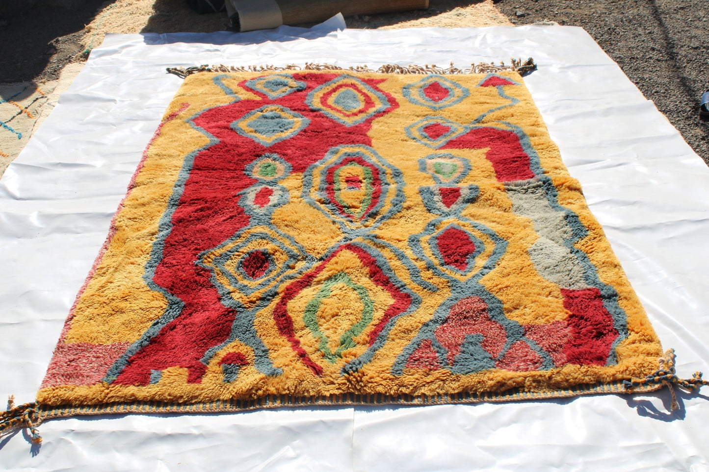 Beni Ourain rugs originate from the Atlas Mountains of Morocco and are characterized by their distinctive, neutral-toned, and geometric designs. These handwoven rugs often feature a plush pile and are made by the Berber tribes, size is 270x180 cm