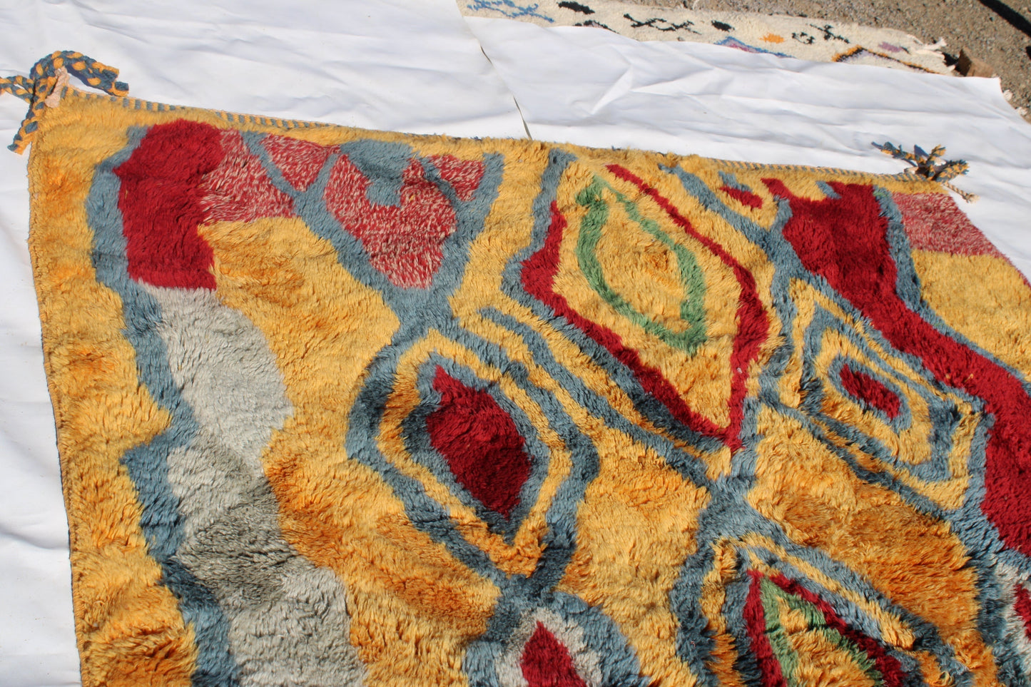 Beni Ourain rugs originate from the Atlas Mountains of Morocco and are characterized by their distinctive, neutral-toned, and geometric designs. These handwoven rugs often feature a plush pile and are made by the Berber tribes, size is 270x180 cm