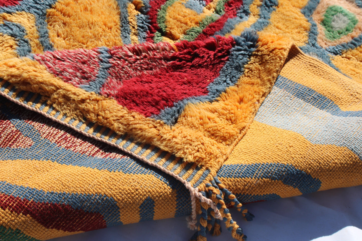 Beni Ourain rugs originate from the Atlas Mountains of Morocco and are characterized by their distinctive, neutral-toned, and geometric designs. These handwoven rugs often feature a plush pile and are made by the Berber tribes, size is 270x180 cm