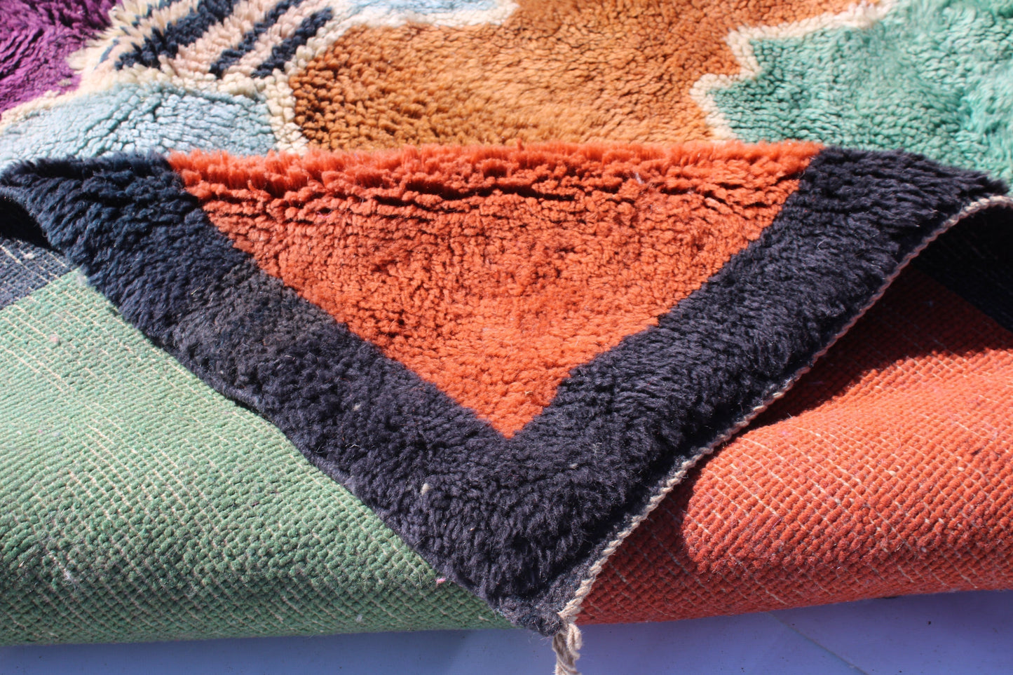 Beni Ourain rugs originate from the Atlas Mountains of Morocco and are characterized by their distinctive, neutral-toned, and geometric designs. These handwoven rugs often feature a plush pile and are made by the Berber tribes, size is 270x192 cm