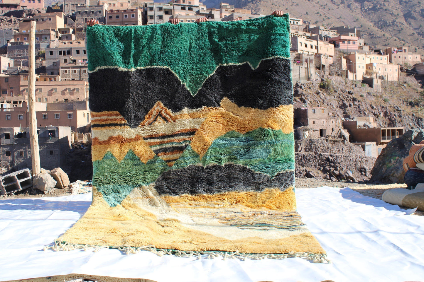 Beni Ourain rugs originate from the Atlas Mountains of Morocco and are characterized by their distinctive, neutral-toned, and geometric designs. These handwoven rugs often feature a plush pile and are made by the Berber tribes, size is 280x177 cm