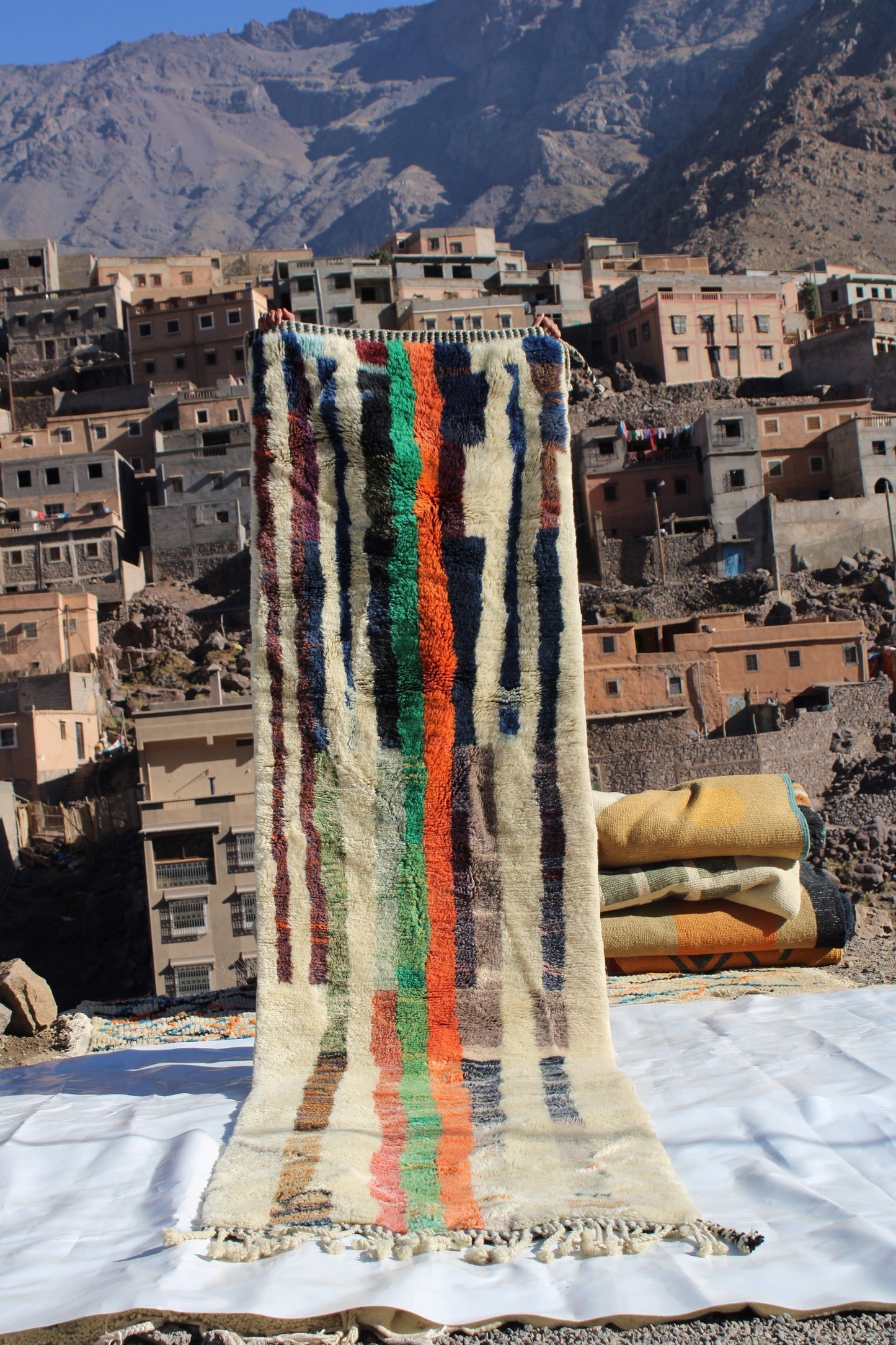 Beni Ourain rugs originate from the Atlas Mountains of Morocco and are characterized by their distinctive, neutral-toned, and geometric designs. These handwoven rugs often feature a plush pile and are made by the Berber tribes, size is 365x92 cm