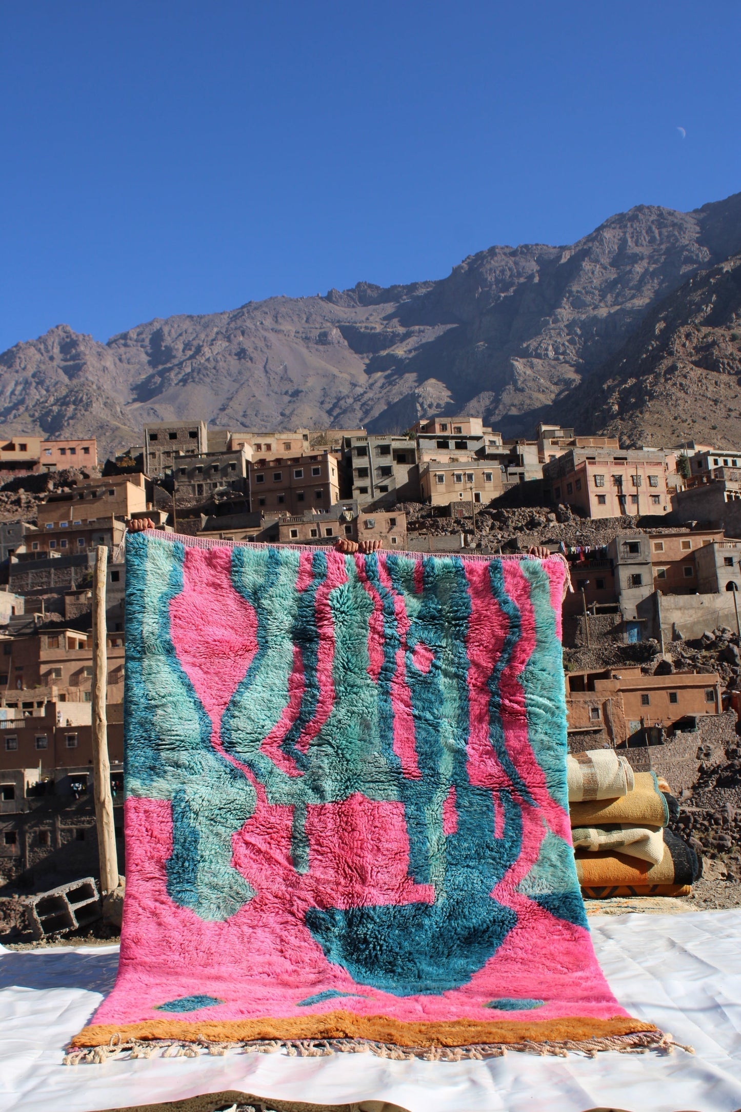 Beni Ourain rugs originate from the Atlas Mountains of Morocco and are characterized by their distinctive, neutral-toned, and geometric designs. These handwoven rugs often feature a plush pile and are made by the Berber tribes, size is 263x177 cm