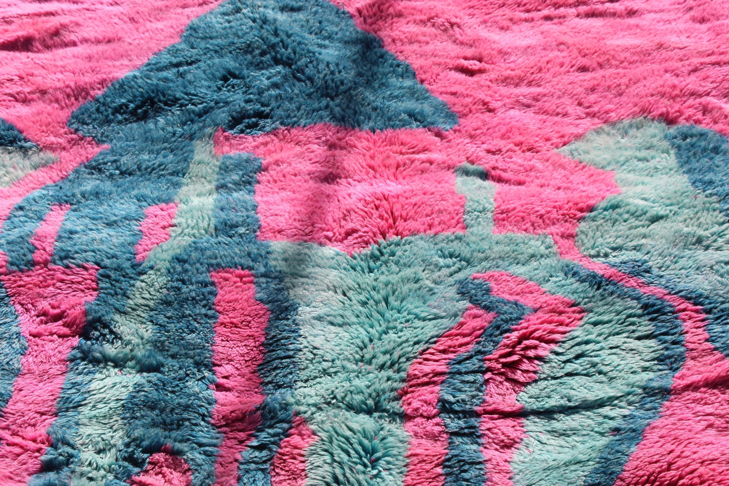 Beni Ourain rugs originate from the Atlas Mountains of Morocco and are characterized by their distinctive, neutral-toned, and geometric designs. These handwoven rugs often feature a plush pile and are made by the Berber tribes, size is 263x177 cm
