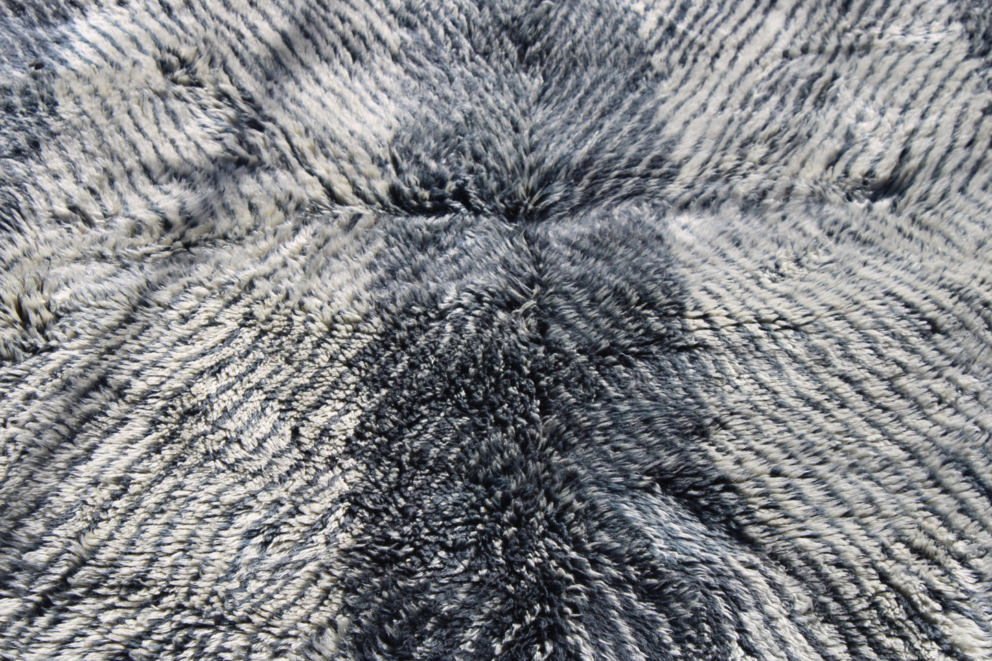 Beni Ourain rugs originate from the Atlas Mountains of Morocco and are characterized by their distinctive, neutral-toned, and geometric designs. These handwoven rugs often feature a plush pile and are made by the Berber tribes, size is 254x190 cm