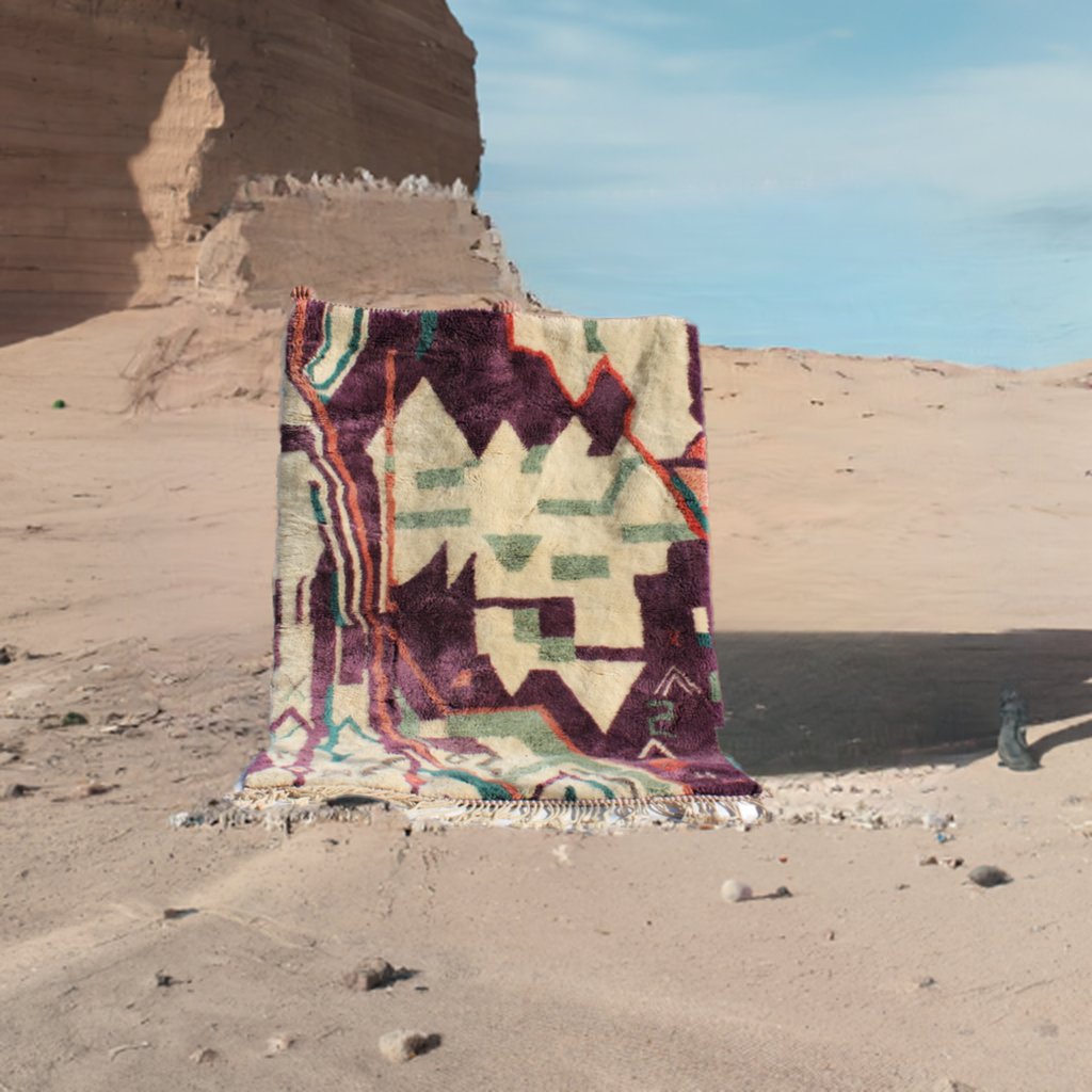 Beni Ourain rugs originate from the Atlas Mountains of Morocco and are characterized by their distinctive, neutral-toned, and geometric designs. These handwoven rugs often feature a plush pile and are made by the Berber tribes, size is 224x160 cm