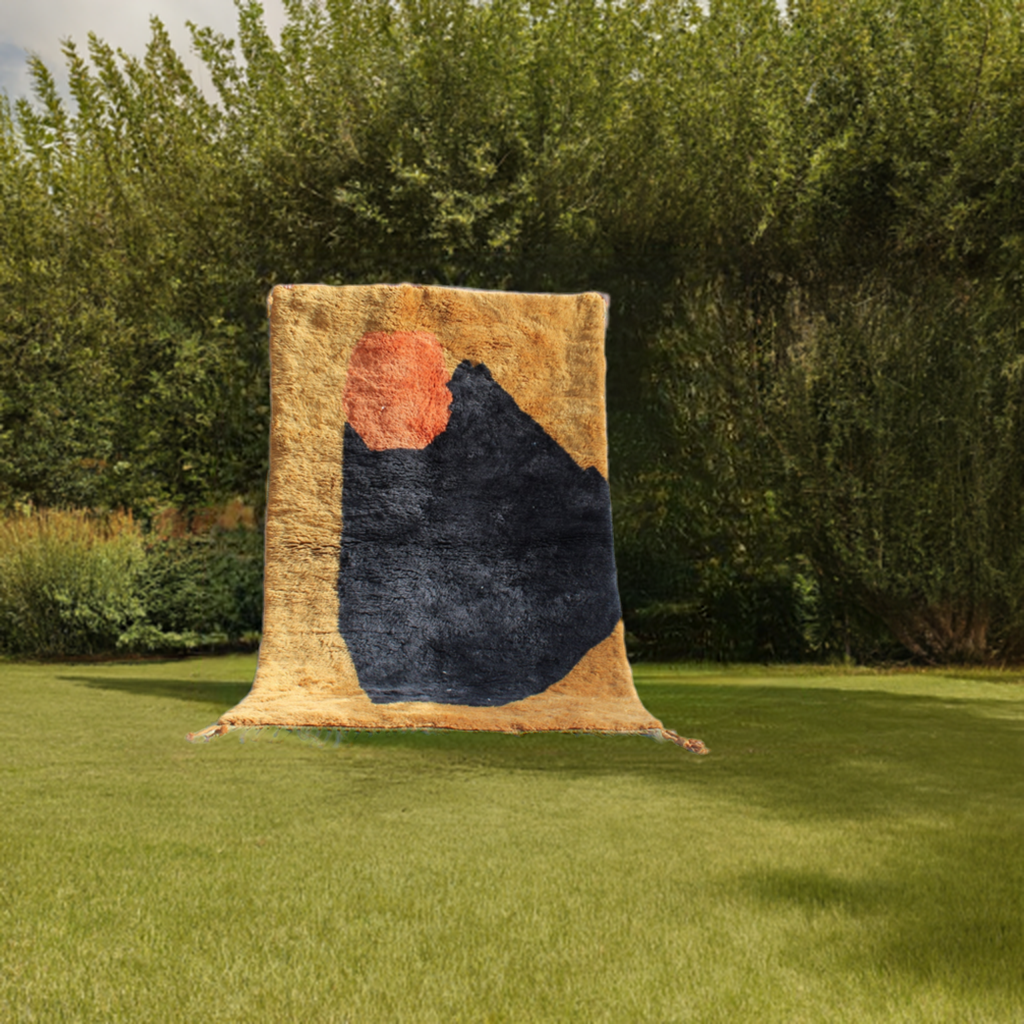 Beni Ourain rugs originate from the Atlas Mountains of Morocco and are characterized by their distinctive, neutral-toned, and geometric designs. These handwoven rugs often feature a plush pile and are made by the Berber tribes, size is 240x150 cm
