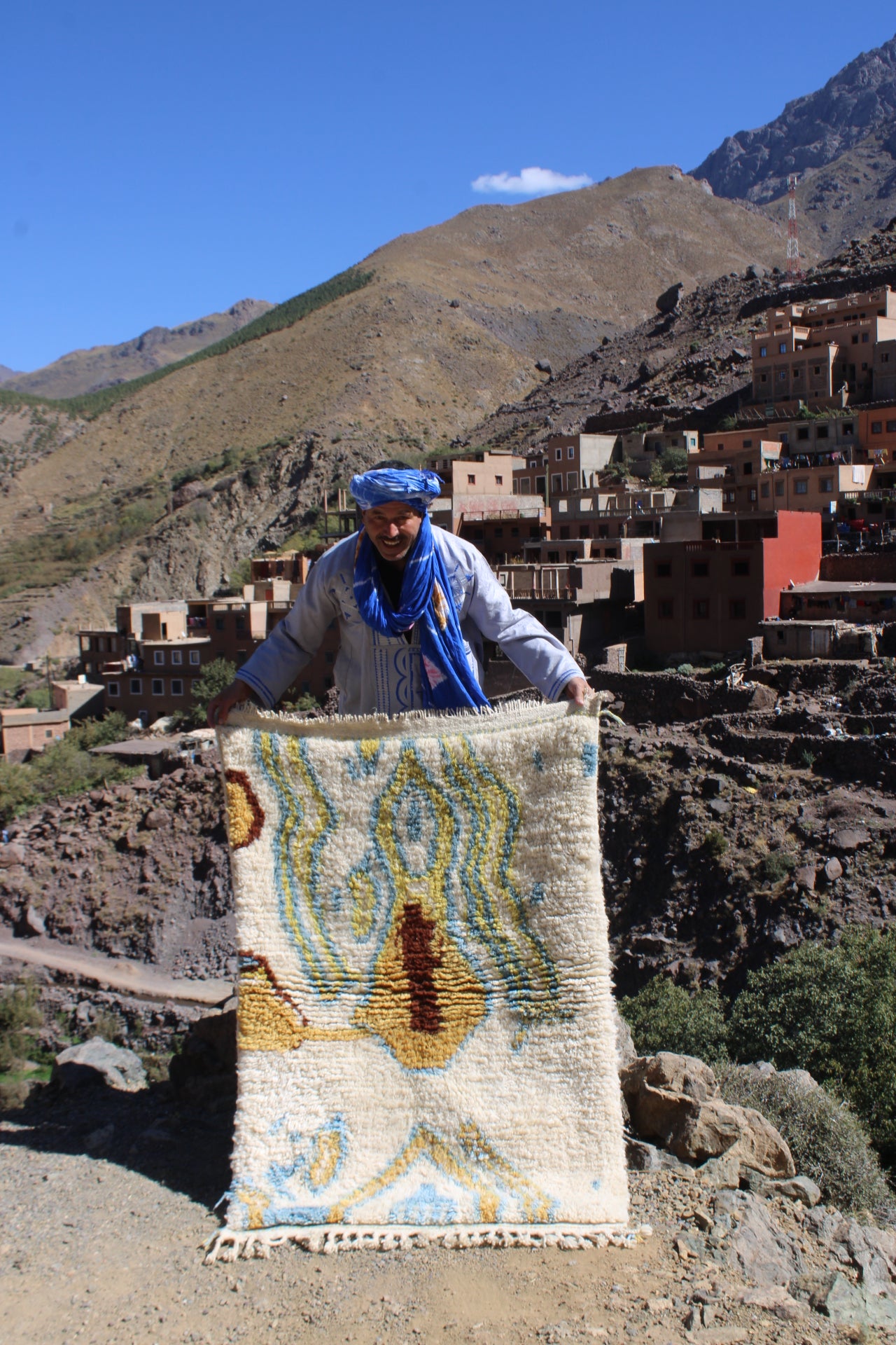 Handmade Moroccan Azilal rug in 100% wool, cream base with colorful tribal patterns, size 150x100 cm (5x3.3 ft), bohemian home decor.