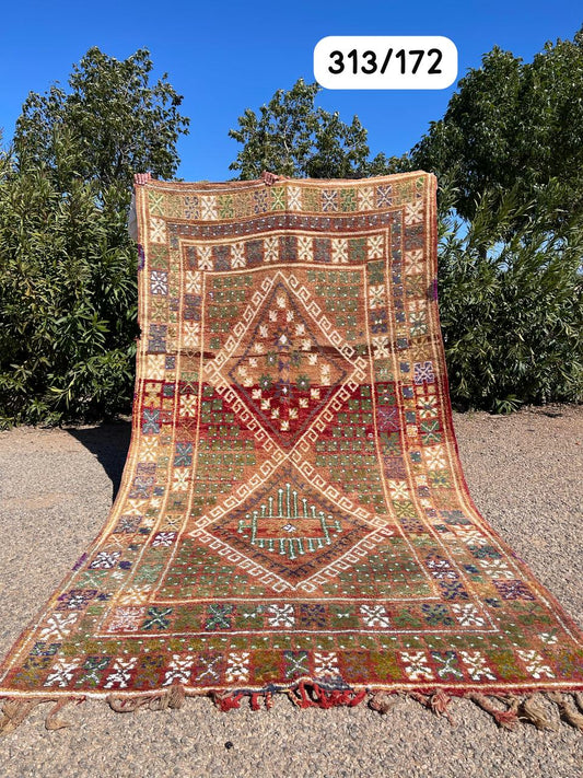 Transform your space with the exquisite charm of our Fabulous Boujad Rug, a true work of art crafted by skilled artisans in the heart of Morocco. This authentic Moroccan rug showcases the rich heritage and vibrant culture of the Boujad region
