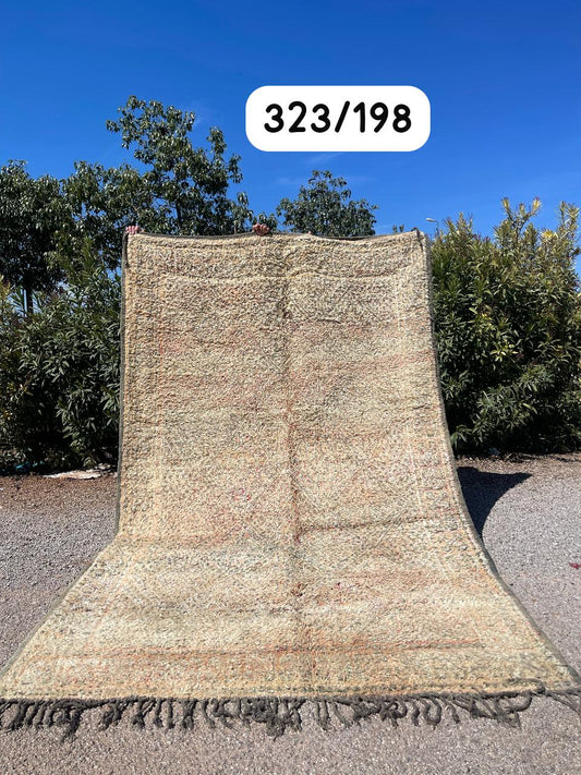 Transform your space with the exquisite charm of our Fabulous Boujad Rug, a true work of art crafted by skilled artisans in the heart of Morocco. This authentic Moroccan rug showcases the rich heritage and vibrant culture of the Boujad region