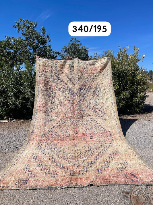 Transform your space with the exquisite charm of our Fabulous Boujad Rug, a true work of art crafted by skilled artisans in the heart of Morocco. This authentic Moroccan rug showcases the rich heritage and vibrant culture of the Boujad region