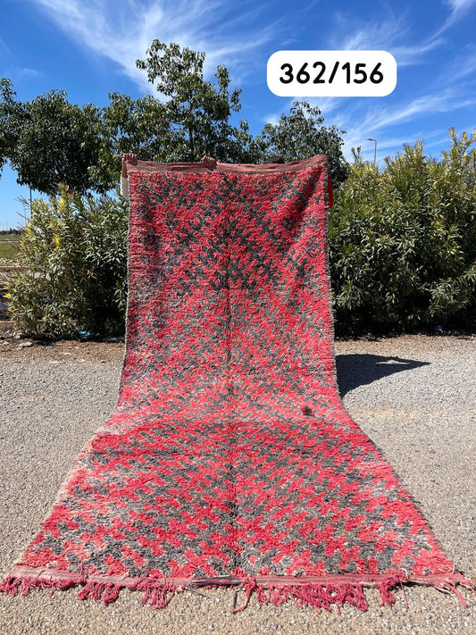 Transform your space with the exquisite charm of our Fabulous Boujad Rug, a true work of art crafted by skilled artisans in the heart of Morocco. This authentic Moroccan rug showcases the rich heritage and vibrant culture of the Boujad region
