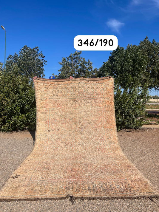 Transform your space with the exquisite charm of our Fabulous Boujad Rug, a true work of art crafted by skilled artisans in the heart of Morocco. This authentic Moroccan rug showcases the rich heritage and vibrant culture of the Boujad region