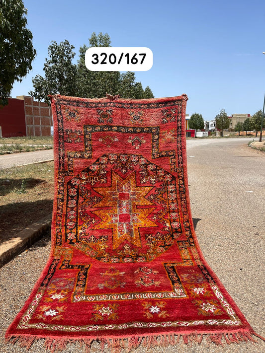 Transform your space with the exquisite charm of our Fabulous Boujad Rug, a true work of art crafted by skilled artisans in the heart of Morocco. This authentic Moroccan rug showcases the rich heritage and vibrant culture of the Boujad region