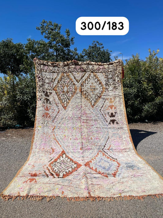 Transform your space with the exquisite charm of our Fabulous Boujad Rug, a true work of art crafted by skilled artisans in the heart of Morocco. This authentic Moroccan rug showcases the rich heritage and vibrant culture of the Boujad region
