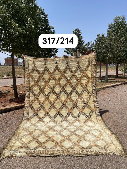 Transform your space with the exquisite charm of our Fabulous Boujad Rug, a true work of art crafted by skilled artisans in the heart of Morocco. This authentic Moroccan rug showcases the rich heritage and vibrant culture of the Boujad region