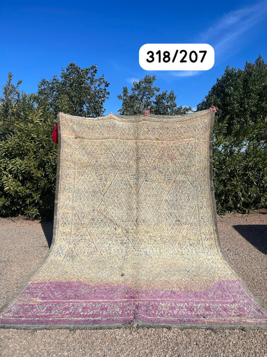 Transform your space with the exquisite charm of our Fabulous Boujad Rug, a true work of art crafted by skilled artisans in the heart of Morocco. This authentic Moroccan rug showcases the rich heritage and vibrant culture of the Boujad region