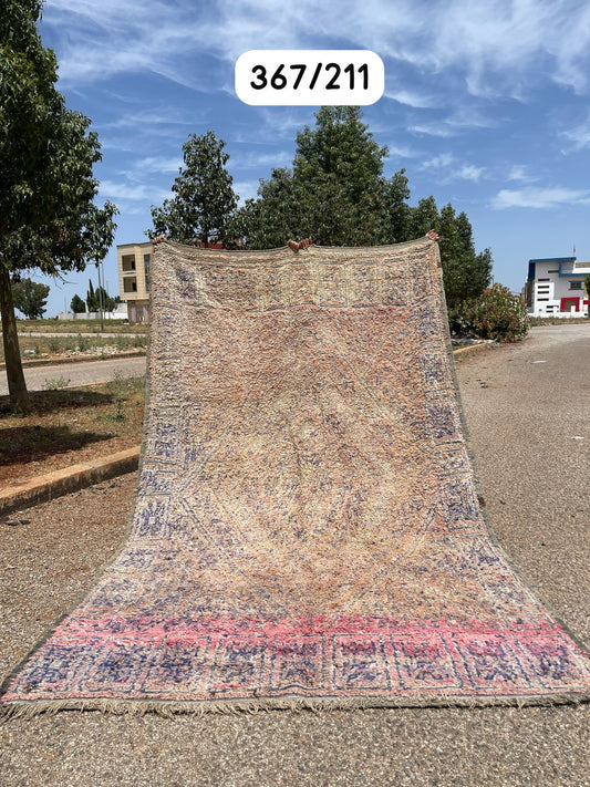 Transform your space with the exquisite charm of our Fabulous Boujad Rug, a true work of art crafted by skilled artisans in the heart of Morocco. This authentic Moroccan rug showcases the rich heritage and vibrant culture of the Boujad region