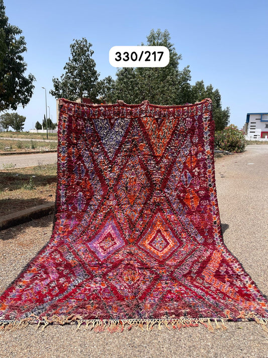 Transform your space with the exquisite charm of our Fabulous Boujad Rug, a true work of art crafted by skilled artisans in the heart of Morocco. This authentic Moroccan rug showcases the rich heritage and vibrant culture of the Boujad region