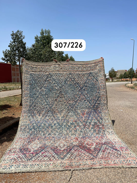 Transform your space with the exquisite charm of our Fabulous Boujad Rug, a true work of art crafted by skilled artisans in the heart of Morocco. This authentic Moroccan rug showcases the rich heritage and vibrant culture of the Boujad region